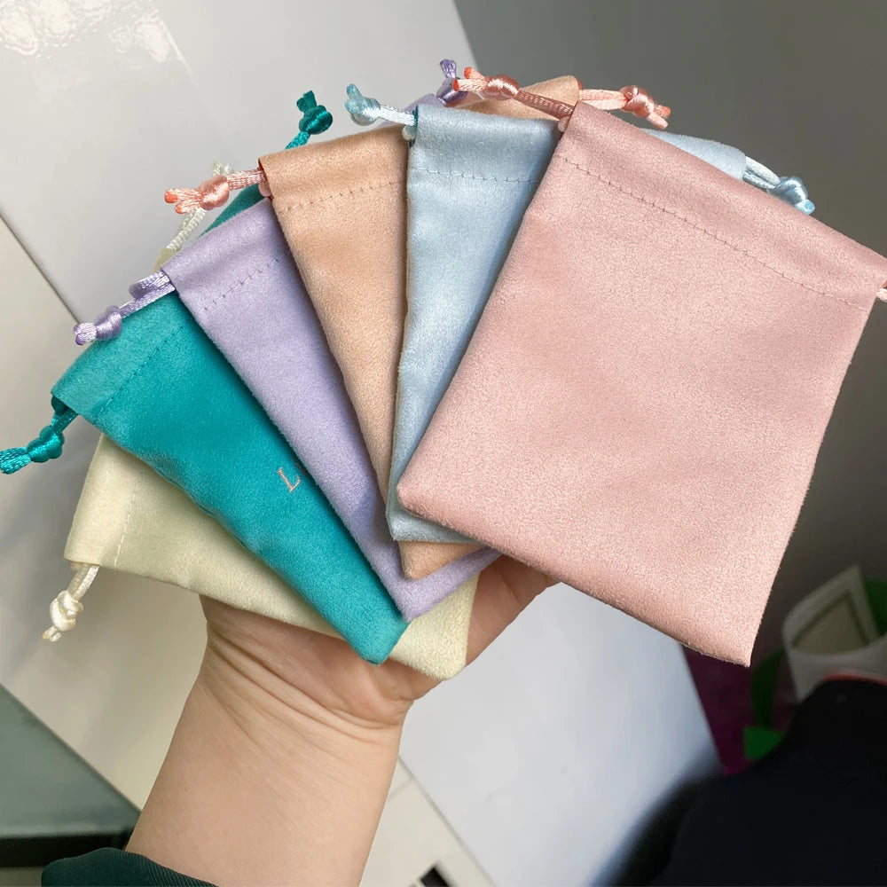 50pcs 7x9cm Light Blue Flannel Drawstring Packing Jewelry Packaging Display Luxury Velvet Suede Pouches Wedding Favors Gift Bags
