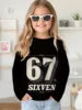 2025 Spring and Autumn Girls Korean Edition Loose Round Neck Long Sleeve T-shirt Top