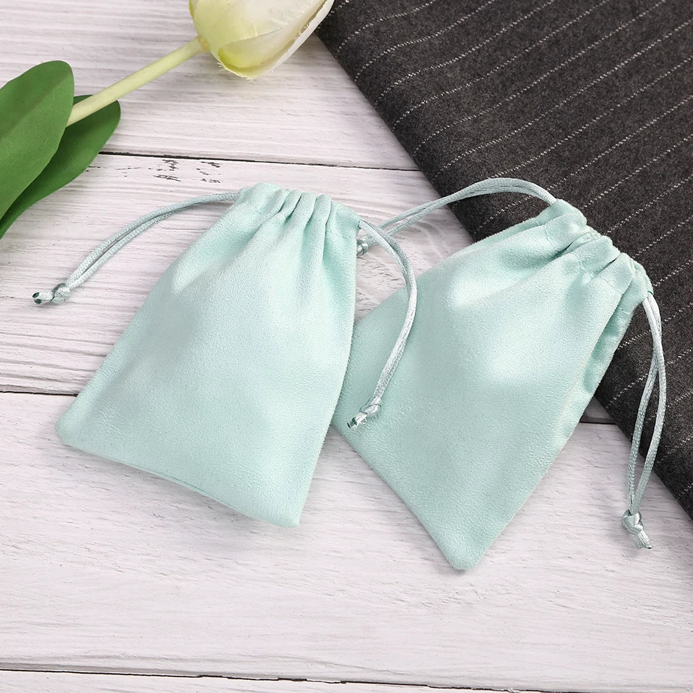 50pcs 7x9cm Light Blue Flannel Drawstring Packing Jewelry Packaging Display Luxury Velvet Suede Pouches Wedding Favors Gift Bags