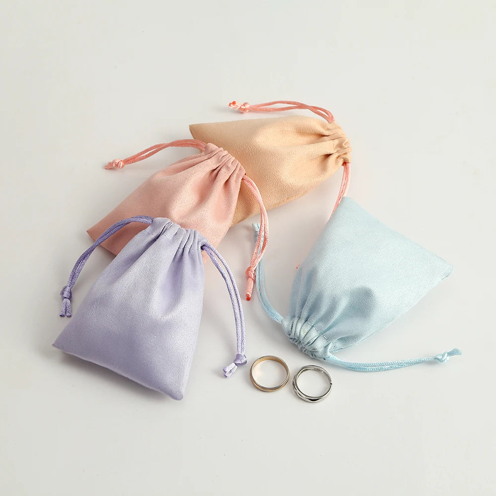 50pcs 7x9cm Light Blue Flannel Drawstring Packing Jewelry Packaging Display Luxury Velvet Suede Pouches Wedding Favors Gift Bags