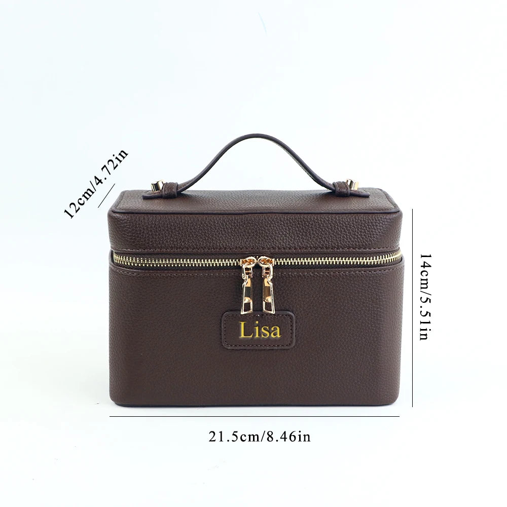 Customized name PU leather makeup bag with compartmentalized storage design, large capacity, and includes a makeup bag.