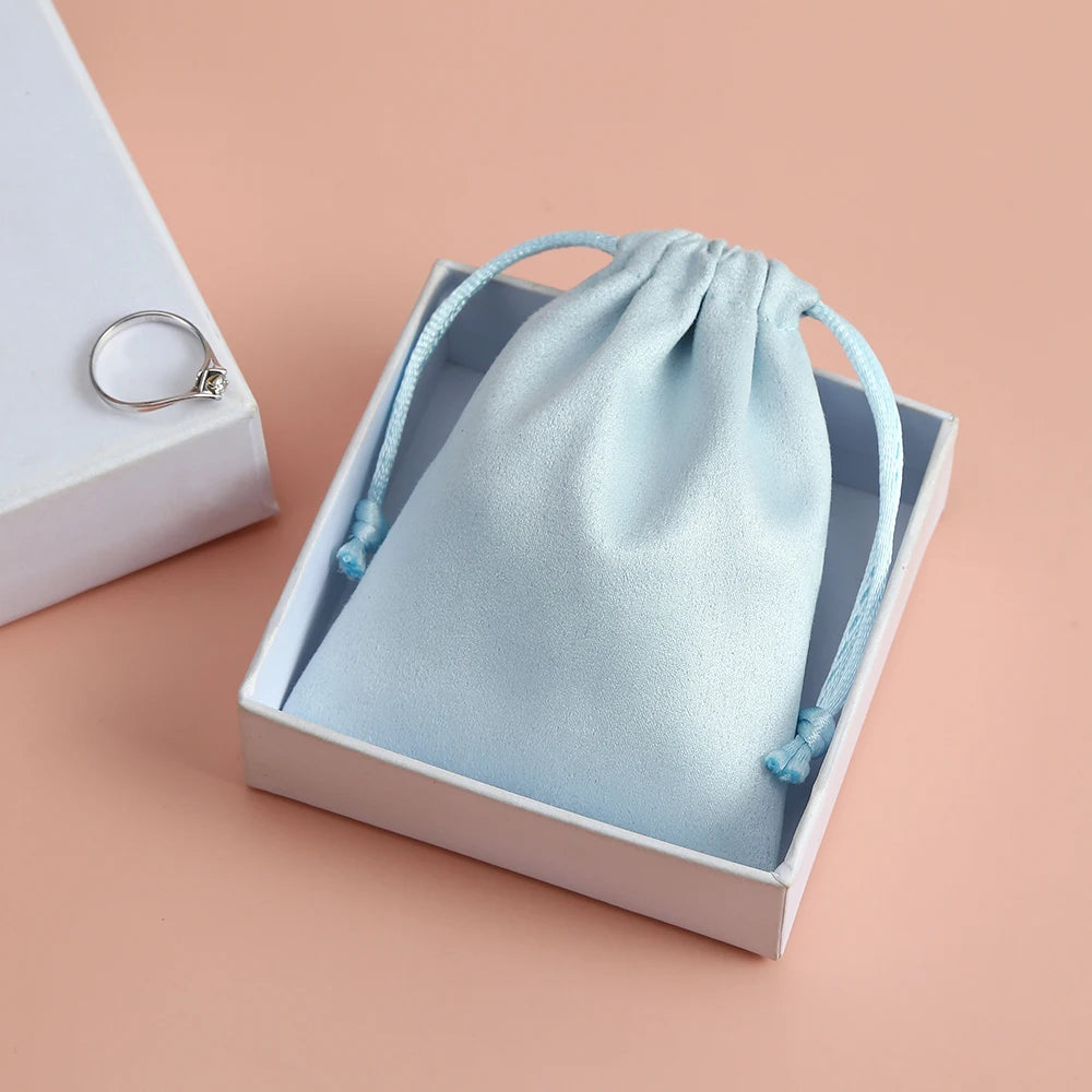 50pcs 7x9cm Light Blue Flannel Drawstring Packing Jewelry Packaging Display Luxury Velvet Suede Pouches Wedding Favors Gift Bags