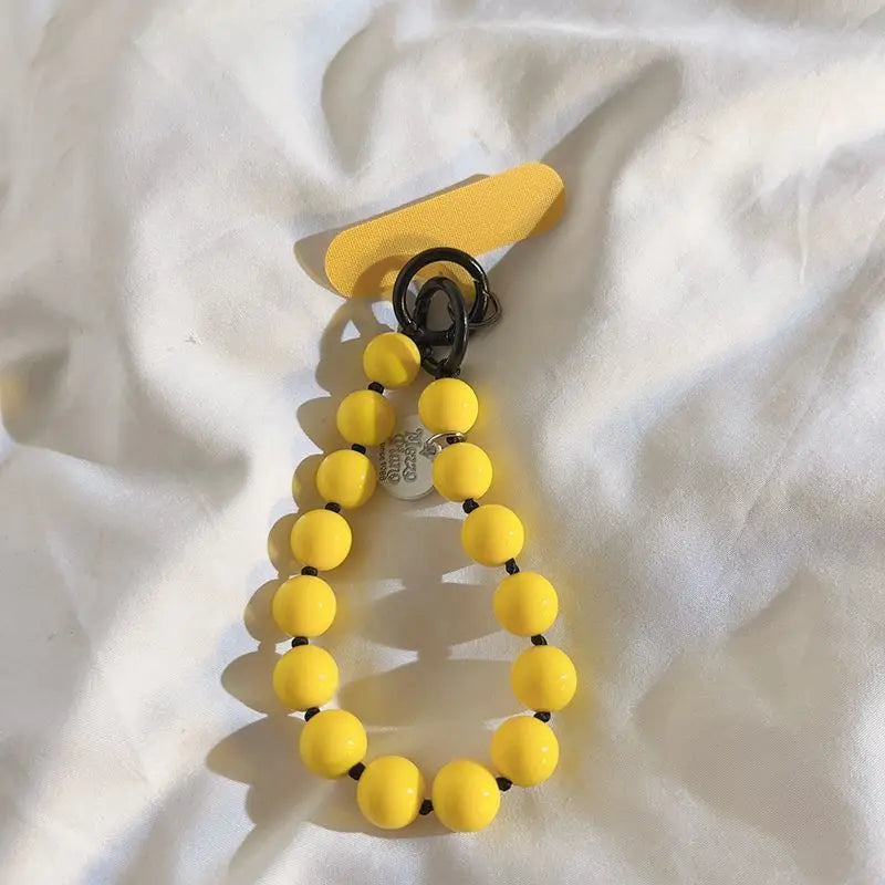 1 x Unisex plain, minimalist mobile phone wrist strap; available in 8 colours with beaded heart-shaped charms; versatile mobile