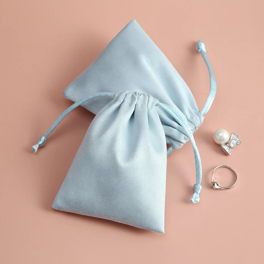 50pcs 7x9cm Light Blue Flannel Drawstring Packing Jewelry Packaging Display Luxury Velvet Suede Pouches Wedding Favors Gift Bags