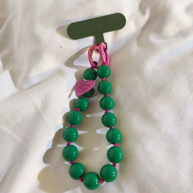 1 x Unisex plain, minimalist mobile phone wrist strap; available in 8 colours with beaded heart-shaped charms; versatile mobile