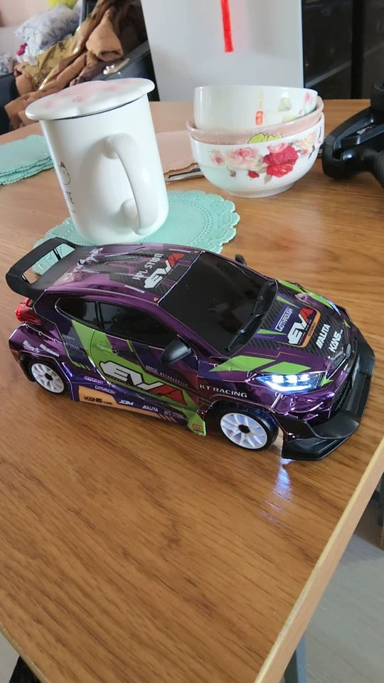Hongxing 1 24 RC 4WD High Speed Drift Car Full Scale Gyroscope With Lithium Battery 2 Sets Of Wheels Independent Shock Absorber