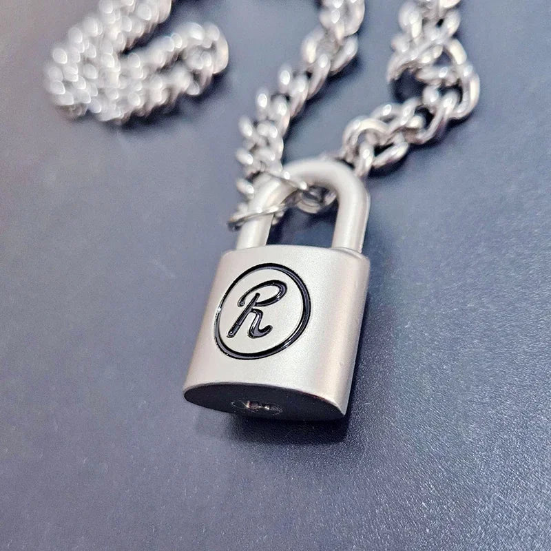 Unique design novel shape glossy and Simpli silvery keylock men pendant charms black border letter R necklace gentleman's jewelr