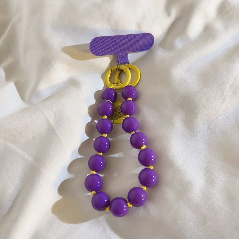 1 x Unisex plain, minimalist mobile phone wrist strap; available in 8 colours with beaded heart-shaped charms; versatile mobile
