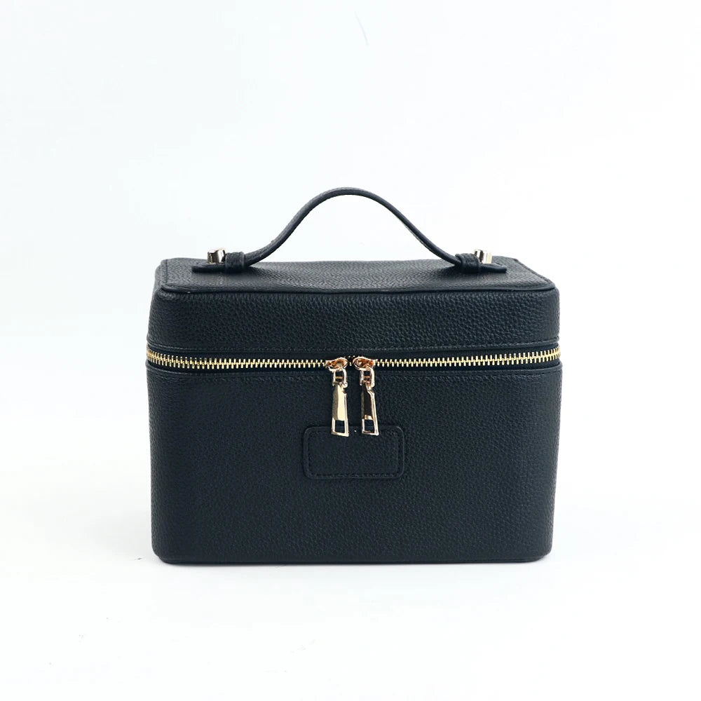 Customized name PU leather makeup bag with compartmentalized storage design, large capacity, and includes a makeup bag.