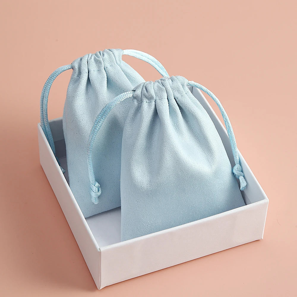 50pcs 7x9cm Light Blue Flannel Drawstring Packing Jewelry Packaging Display Luxury Velvet Suede Pouches Wedding Favors Gift Bags