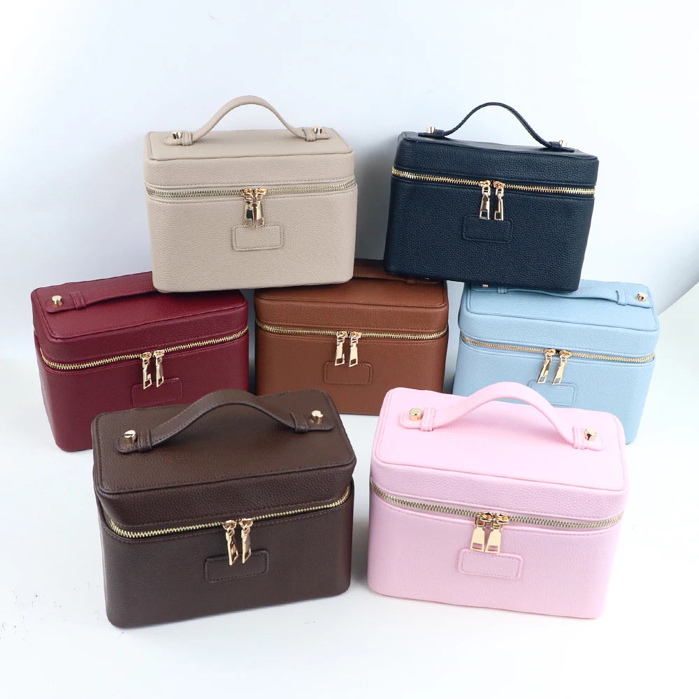 Customized name PU leather makeup bag with compartmentalized storage design, large capacity, and includes a makeup bag.