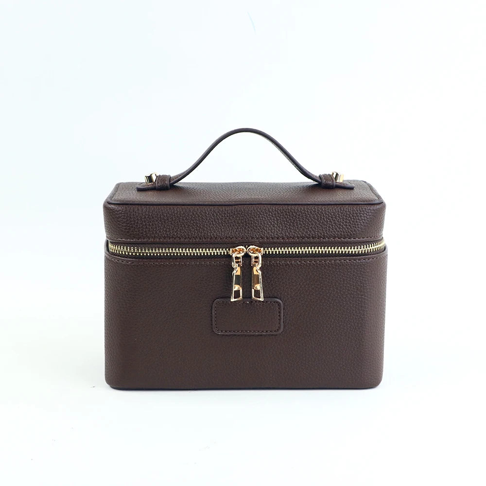 Customized name PU leather makeup bag with compartmentalized storage design, large capacity, and includes a makeup bag.