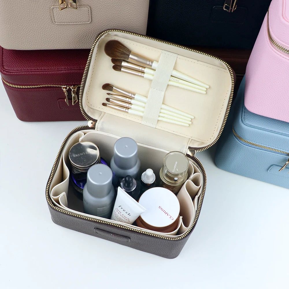 Customized name PU leather makeup bag with compartmentalized storage design, large capacity, and includes a makeup bag.