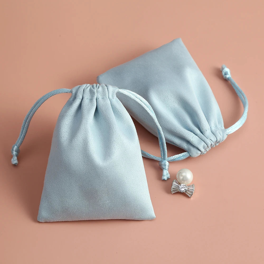50pcs 7x9cm Light Blue Flannel Drawstring Packing Jewelry Packaging Display Luxury Velvet Suede Pouches Wedding Favors Gift Bags
