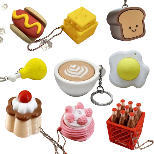 Stress resistant keychain toy - fun stress relieving buttons in strawberry cake, coffee, and chicken legs, designed for all ages